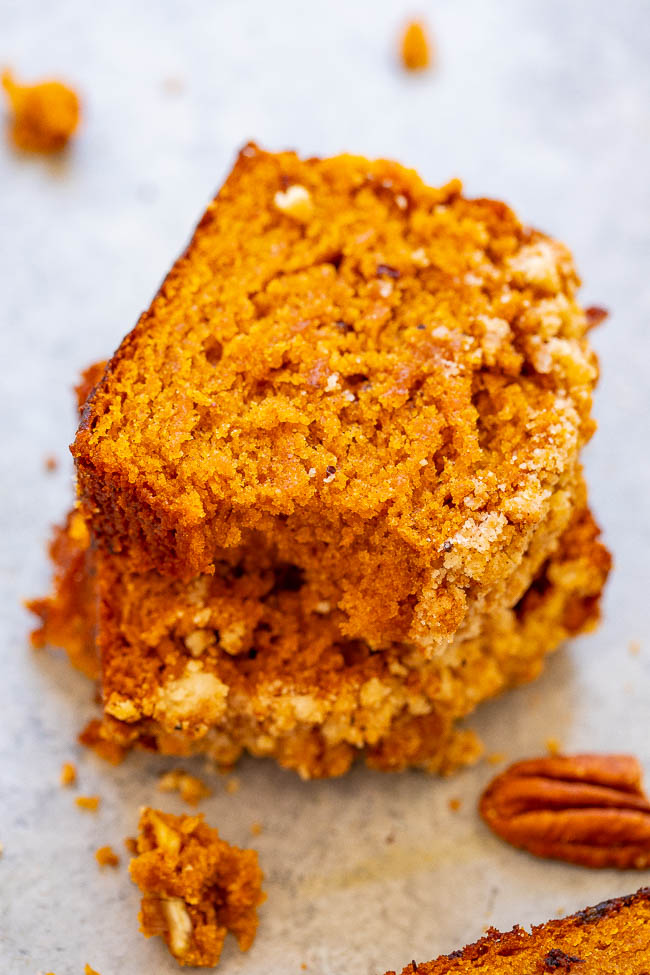 slice of moist pumpkin bread with crumble topping 