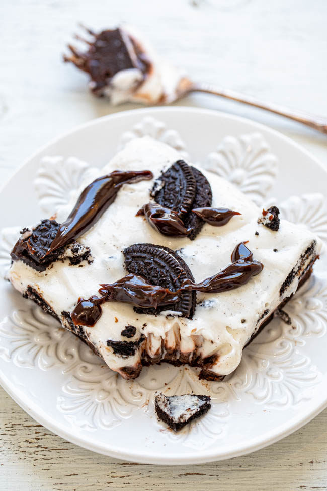 Mississippi mud bars on a white plate with a forkful in the background