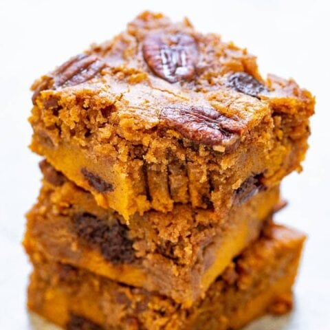 Soft Pumpkin Praline Bars - SUPER soft pumpkin bars studded with chocolate chips, candied pecans, and plenty of pumpkin pie spice!! A FAST and EASY dessert that feeds a crowd for your fall and winter celebrations!!