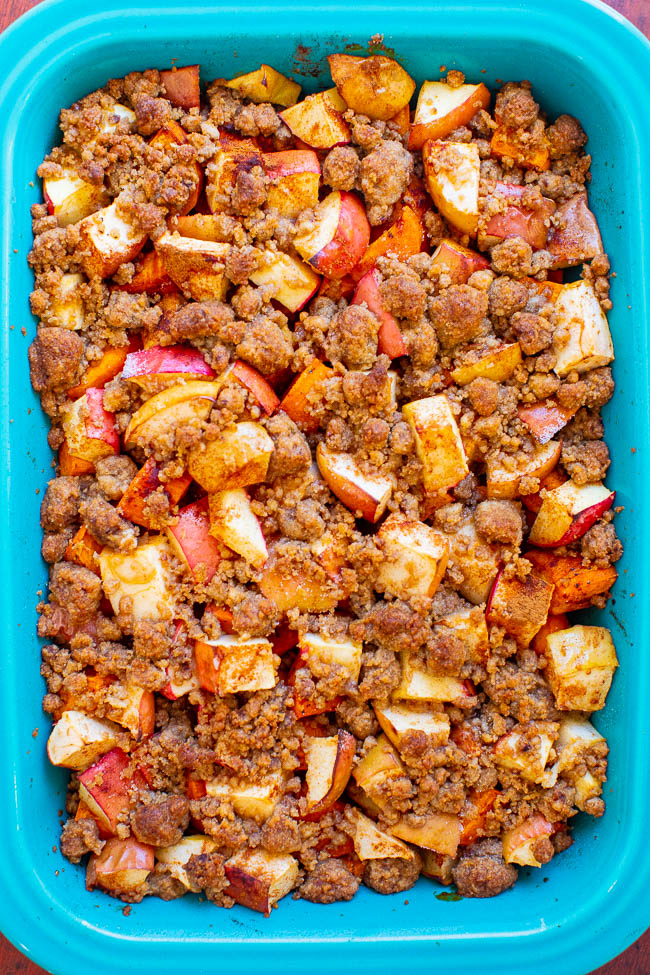 overhead view of sweet potato and apple casserole in a blue baking dish.