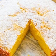Lemon Olive Oil Cake with a slice missing.