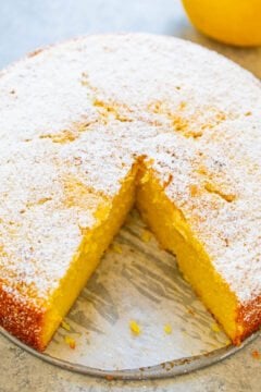 Lemon Olive Oil Cake with a slice missing.
