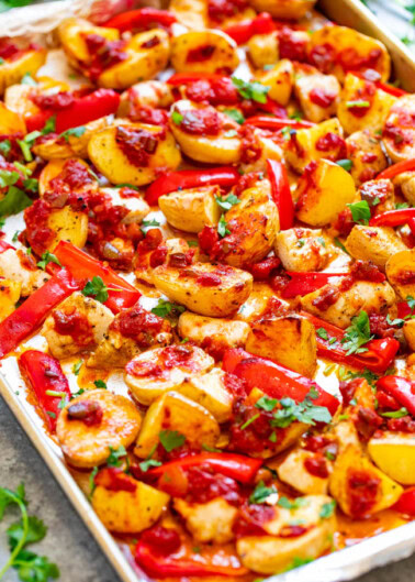 Sheet Pan Salsa Chicken and Potatoes - An EASY dinner that's ready in 30 minutes and made on ONE pan with so much FLAVOR!! The salsa keeps the chicken so juicy for a winner-winner-chicken-dinner that's perfect for busy nights!!
