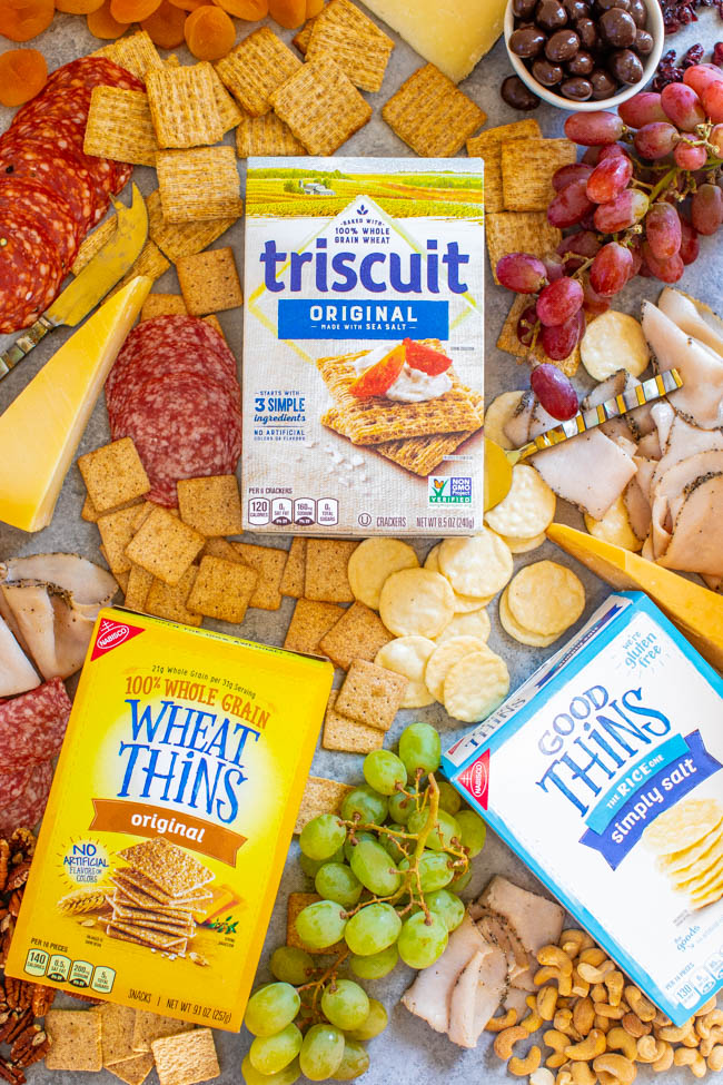 Girls Night Charcuterie Board - A SALTY-SWEET mix of meats, cheeses, fruit, chocolate almonds, Triscuits, Wheat Thins, GOOD THiNS, and more for your next GIRLS-NIGHT-IN!! There's something for everyone on this EASY-TO-ASSEMBLE board!!