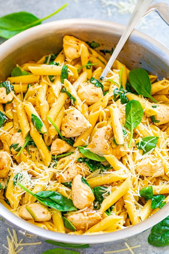 Lemony Chicken Spinach Pasta — EASY and ready in 20 minutes with comforting pasta, juicy chicken, a hint of lemon, and the PERFECT amount of Parmesan!! Great for busy weeknights and the extra is good for meal prepping!! 