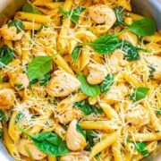 Parmesan Chicken and Spinach Pasta - EASY and ready in 20 minutes with comforting pasta, juicy chicken, a hint of lemon, and the PERFECT amount of Parmesan!! Great for busy weeknights and the extra is good for meal prepping!! 