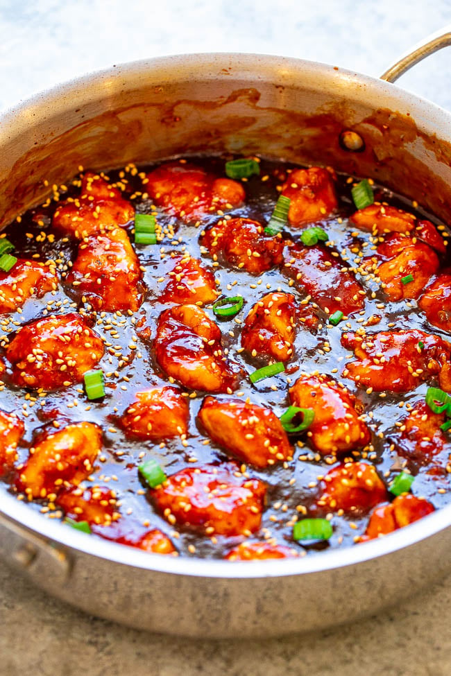 Better-Than-Takeout Sticky Chicken - Stop calling for takeout or going to the mall food court and make this AMAZING sticky chicken at home in 15 minutes!! So EASY with the perfect balance of sweet and spicy with plenty of sticky sauce!! 