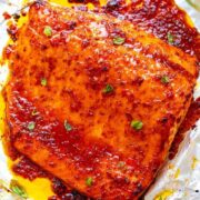 Sheet Pan Chili Dijon Salmon - A 5-ingredient salmon recipe that tastes 5-STARS and is ready in 25 minutes!! Loaded with layers of incredible flavor from two types of chili sauce, Dijon mustard, and honey! You'll LOVE this salmon recipe!!