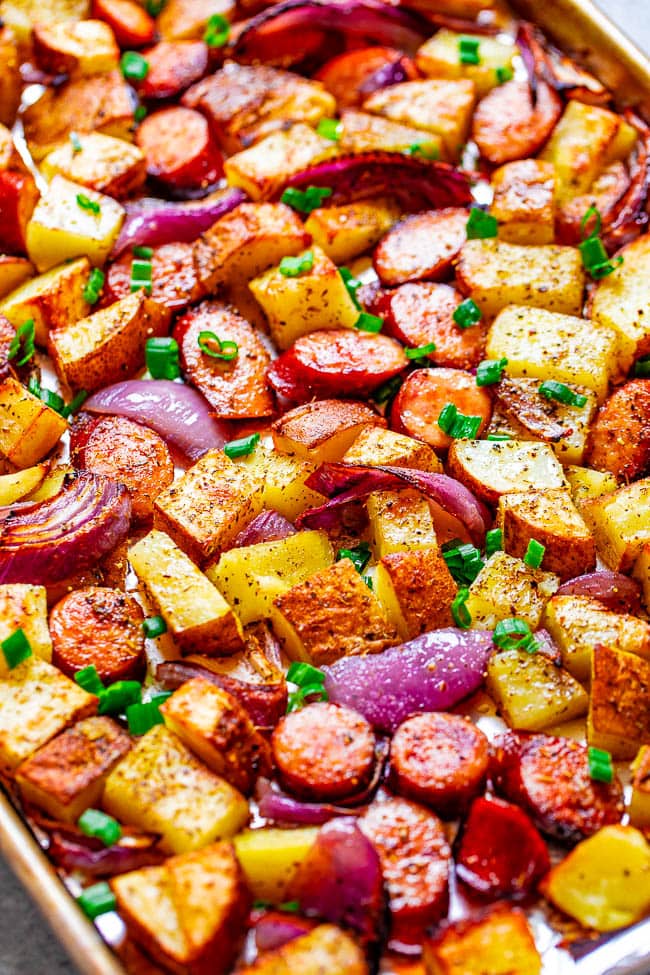 Sheet Pan Sausage And Potatoes - This EASY sheet pan sausage dinner with just 5 ingredients can be made with your pre-cooked sausage of choice and is ready in 45 minutes!! Hearty comfort food with tons of FLAVOR and the recipe is super customizable!!