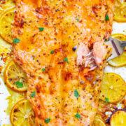 Lemon Pepper Dijon Salmon - Juicy baked salmon at home in 20 minutes that’s so EASY and tastes BETTER than from a fancy restaurant!! The lemons, lemon pepper, and Dijon add so much rich FLAVOR to this FOOLPROOF sheet pan salmon!!