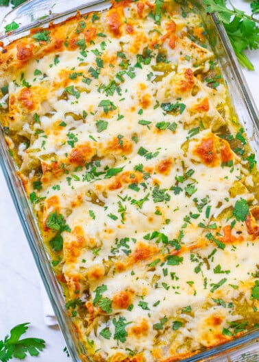 Salsa Verde Chicken Enchiladas - EASY juicy enchiladas with so much flavor from the salsa verde and TONS of melted CHEESE!! Ready in 30 minutes, are made with just a handful of ingredients, and will be an instant family favorite!!