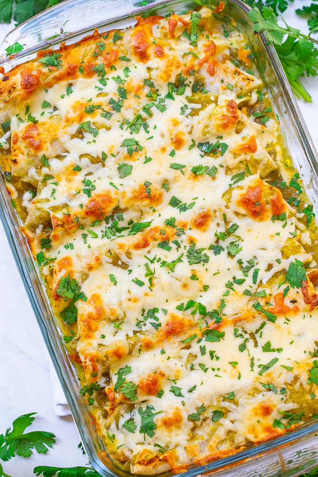 Salsa Verde Chicken Enchiladas - EASY juicy enchiladas with so much flavor from the salsa verde and TONS of melted CHEESE!! Ready in 30 minutes, are made with just a handful of ingredients, and will be an instant family favorite!!