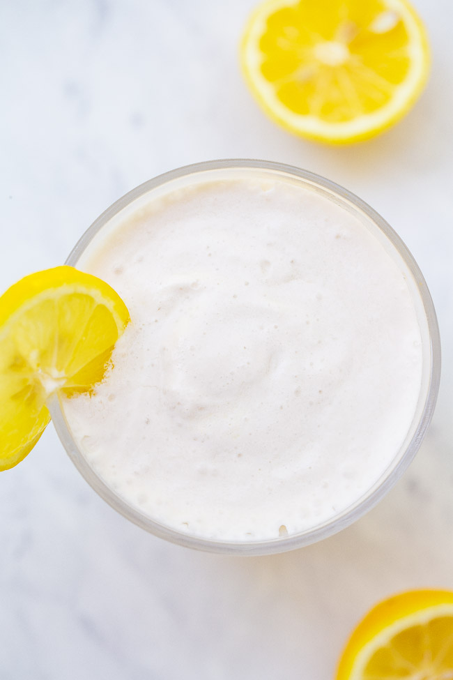 Coconut Frozen Lemonade — The EASIEST THREE ingredient frozen lemonade recipe that's creamy and refreshing with the PERFECT pop of tart lemon flavor!! You can easily spike it for an adults-only batch that's perfect for summer days!!