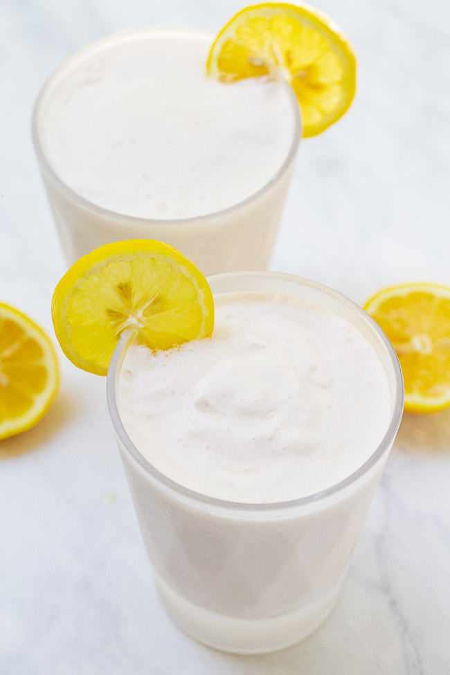 Coconut Frozen Lemonade — The EASIEST THREE ingredient frozen lemonade recipe that's creamy and refreshing with the PERFECT pop of tart lemon flavor!! You can easily spike it for an adults-only batch that's perfect for summer days!!