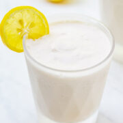 Frozen Coconut Lemonade - The EASIEST THREE ingredient whipped lemonade recipe that's creamy and refreshing with the PERFECT pop of tart lemon flavor!! You can easily spike it for an adults-only batch that's perfect for summer days!!