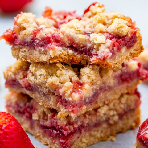 Strawberry Bars with Oatmeal Crumble Topping - These buttery bars are bursting with fresh strawberries!! Just 10 minutes of prep, so EASY because the crust and crumble are one and the same, and a crowd FAVORITE every time!!