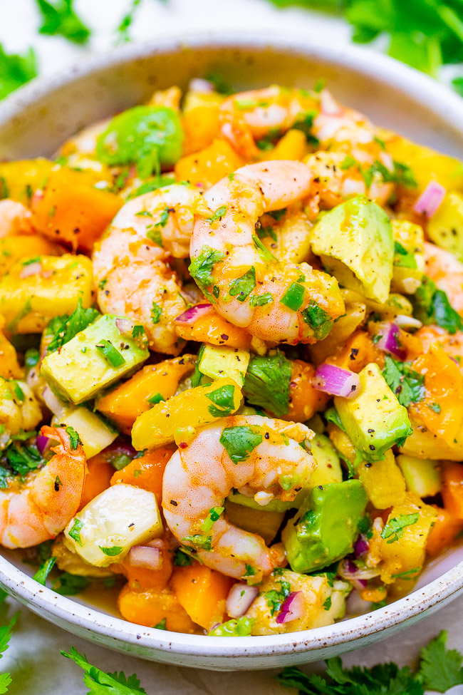 Avocado Mango Shrimp Salad — With tropical fruit, avocado, red onion, lime juice, cilantro, and plump JUICY shrimp, this EASY 15-minute recipe will become a new FAVORITE!! Healthy and light with an assortment of wonderful flavors in every bite!!