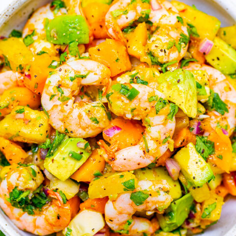 Mango Pineapple Shrimp Salad - With tropical fruit, avocado, red onion, lime juice, cilantro, and plump JUICY shrimp, this EASY 15-minute recipe will become a new FAVORITE!! Healthy and light with an assortment of wonderful flavors in every bite!!