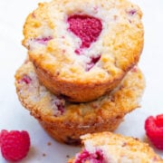 Greek Yogurt Raspberry Muffins - EASY, soft, fluffy muffins bursting with fresh raspberries!! So moist thanks to Greek yogurt in the batter! Not overly sweet and perfect with a cup of coffee or tea!! 