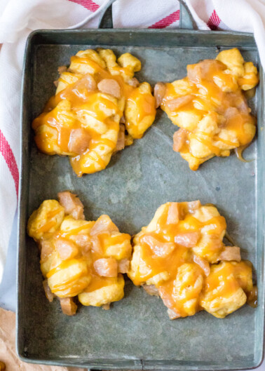 Baked Caramel Apple Fritters - Love the taste of apple fritters but don't want the calories or hassle that comes with frying them? Then these FAST and EASY baked apple fritters made with just four main ingredients are PERFECT!!