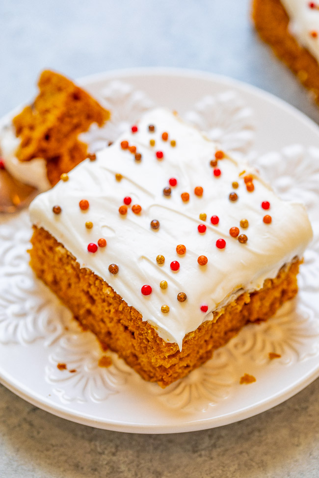 a frosted pumpkin bar on a white plate 