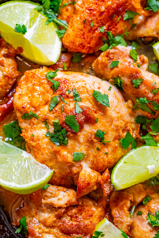 Baked Cilantro Lime Chicken Thighs — EASY, juicy, tender chicken thighs with plenty of tangy lime and fresh cilantro!! Ready in 30 minutes, starts on the stove, and finishes in the oven! Just a handful of ingredients used and PERFECT for busy weeknights!! 
