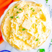 The Best Classic Mashed Potatoes - Buttery, creamy, PERFECT mashed potatoes that rival your favorite restaurant's version but EASY and ready in 45 minutes!! The quintessential holiday side dish for Thanksgiving, Christmas, or a great family-friendly weeknight comfort food side dish!!