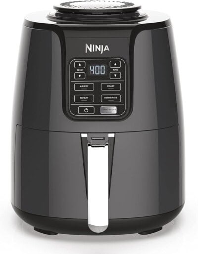 A black Ninja air fryer with digital controls and a handle on the front.