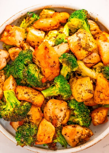 Sheet Pan Salt and Vinegar Chicken and Broccoli - If you like salt and vinegar chips, you'll LOVE this EASY chicken recipe with the same flavor profile that's ready in 15 minutes!! Juicy chicken, crisp-tender broccoli, and a PERFECT salt and vinegary tang!!
