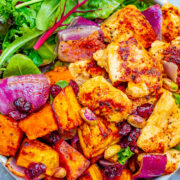 Roasted Chicken and Sweet Potato Harvest Salad - Fall-inspired ingredients including tender sweet potatoes, juicy chicken, red onions, cranberries, and pumpkin seeds topped with a honey apple cider vinaigrette!!  A HEARTY and COMFORTING salad that makes a big batch perfect for planned leftovers!!