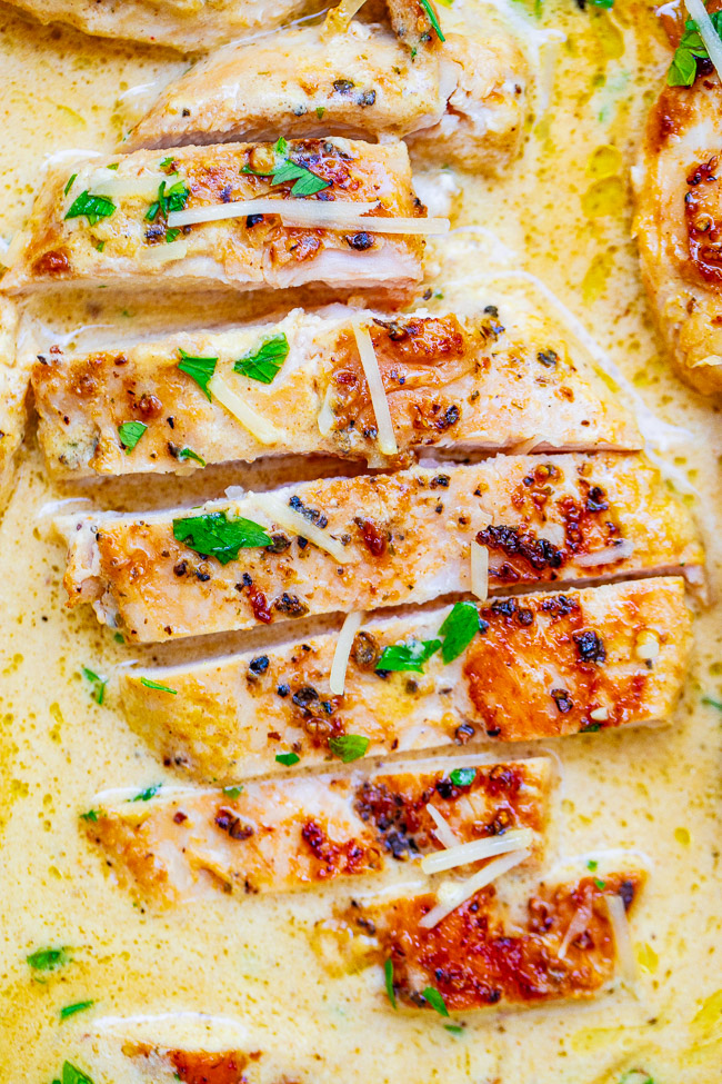 Creamy Dijon Chicken Skillet —Tender, juicy chicken bathed in a divine cream sauce made with garlic, cream, Dijon mustard, and a splash of wine for extra flavor!! This restaurant-quality EASY stovetop chicken is ready in 20 minutes and will be a family FAVORITE! 