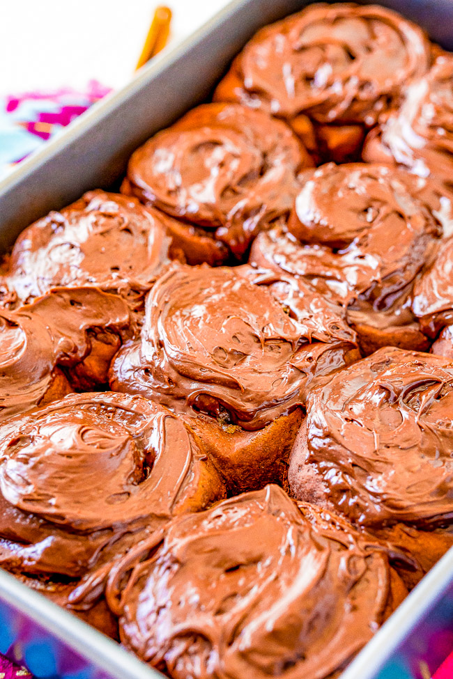 Chocolate Cinnamon Rolls - This ultra chocolaty twist on classic cinnamon rolls is made with doctored up chocolate cake mix and oodles of chocolate frosting!! Soft, tender, fluffy, and EASY!! Calling all chocaholics, these are for YOU!!