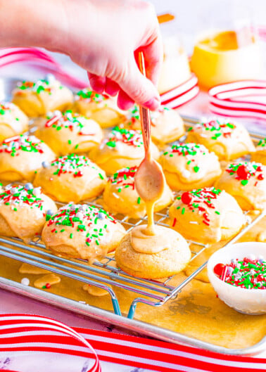 Eggnog Teacakes - Soft, buttery teacakes topped with a creamy eggnog glaze are a Christmas treat that everyone will love!! EASY to make, not at all dry, and great for cookie exchanges or hostess gifts!!