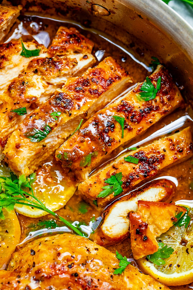 Lemon Butter Dijon Skillet Chicken - Tender, juicy chicken with a scrumptious sauce made with lemon butter, Dijon mustard, and a splash of wine for extra flavor!! This EASY stovetop chicken recipe is ready in 15 minutes and will become a family dinner FAVORITE!!