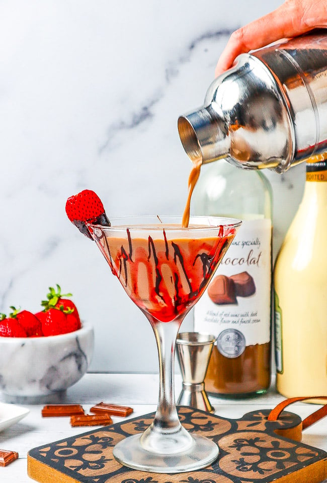 Chocolate Covered Strawberry Martini - An indulgent chocolate martini that's perfect for Valentine's Day, anniversaries, or a girls-night-in! Plenty of chocolate flavor in this festive, fun, and easy martini!
