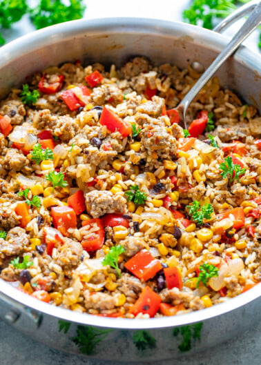15-Minute Cowboy Beef and Rice Skillet - An EASY comfort food recipe with just 5 main ingredients made with everyday staples!! Juicy beef, tender rice, and just the right amount of kick from the salsa make this an automatic FAMILY FAVORITE!! 