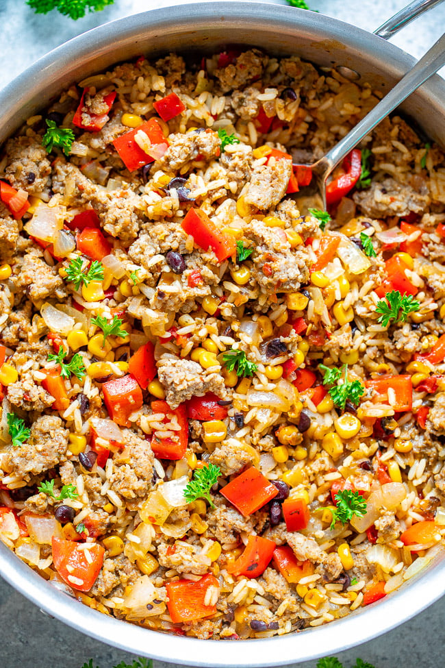 15-Minute Cowboy Beef and Rice Skillet - An EASY comfort food recipe with just 5 main ingredients made with everyday staples!! Juicy beef, tender rice, and just the right amount of kick from the salsa make this an automatic FAMILY FAVORITE!! 