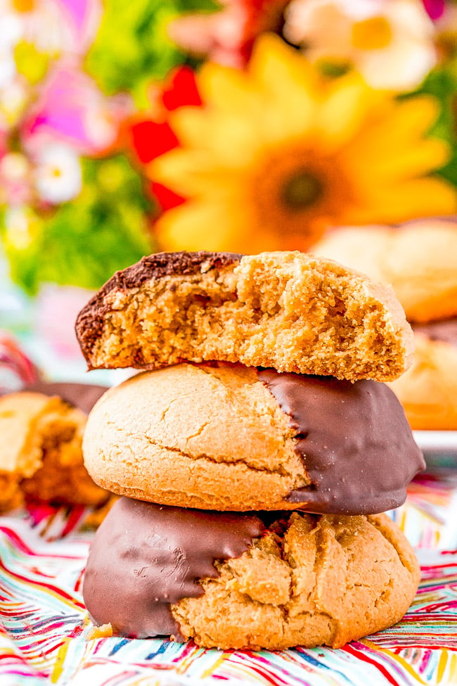 Soft Peanut Butter Pudding Cookies — These chocolate-dipped peanut butter cookies are SOFT AND CHEWY on the inside thanks to the addition of pudding mix in the cookie dough! Dipping them in dark chocolate makes for the PERFECT flavor combo!!