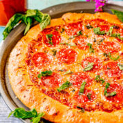 2-Ingredient Pizza Dough - The EASIEST homemade pizza dough you'll ever make with just two ingredients!! NO yeast, NO kneading, and NO need to wait for it to rise! Homemade pizza just became your new reality!!