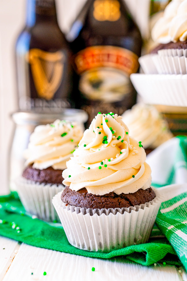 Irish Chocolate Cupcakes - A tender chocolate cupcake made from scratch with batter that's spiked with Guinness, along with a hint of Jameson Irish whiskey in the chocolate ganache filling, and frosted with a silky smooth Baileys buttercream frosting!! Not too boozy and not too sweet! Makes a smaller batch of 12 and PERFECT for St. Patrick’s Day!!