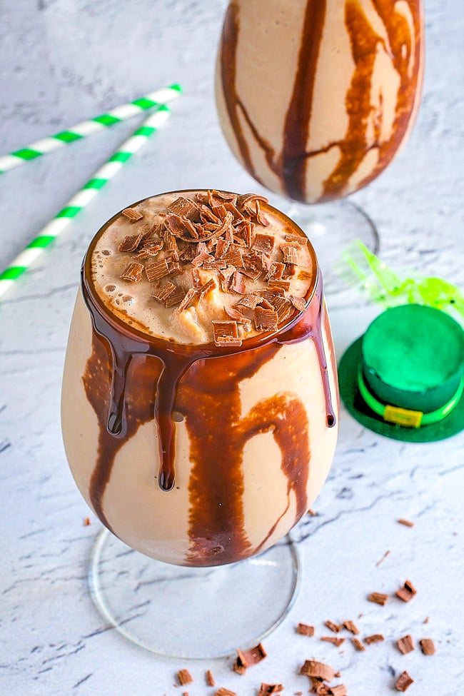Frozen Mudslide — These frozen mudslides are decadent dessert-like drinks made with three types of alcohol for a slightly boozy milkshake with an abundance of chocolate syrup! Perfect for St. Patrick's Day or a warm weather treat to cool you down! 
