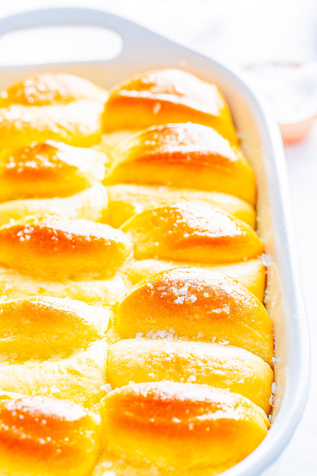 Parker House Rolls - The BEST homemade dinner rolls because they're so light, airy, fluffy and practically melt in your mouth! They have a wonderful buttery flavor that will make them an instant family favorite at your next holiday gathering or make them for a special meal! 