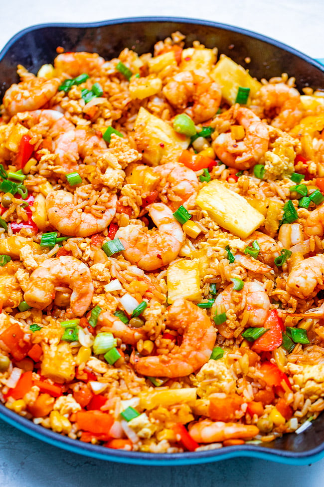 Hawaiian Pineapple Shrimp Fried Rice — A Hawaiian-inspired shrimp fried rice recipe that's EASY, ready in minutes, and has so much authentic flavor!! A family favorite that's better-than-takeout!!