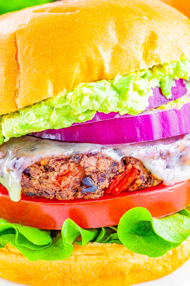 Black Bean Burgers - This will be your new FAVORITE black bean burger recipe! EASY, full of great texture, flavor, and tastes just like a great burger - minus the meat! Can be GRILLED or BAKED!