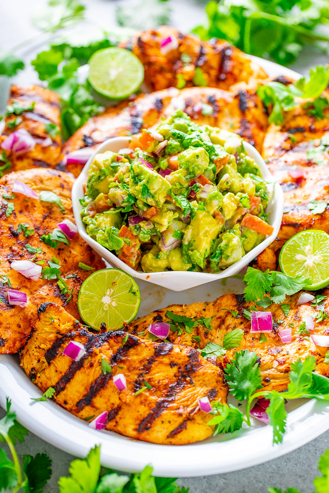Grilled Lime Cilantro Chicken with Guacamole - EASY, ready minutes, and the chicken is tender, juicy, and full of Mexican-inspired flavors!! Chunky guacamole pairs PERFECTLY with this grilled chicken! A family favorite recipe everyone loves!!