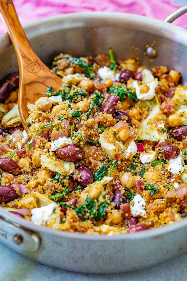 Mediterranean Quinoa Salad — This EASY quinoa salad is ready in 20 minutes with Mediterranean-inspired ingredients including chickpeas, Kalamata olives, artichokes, and goat cheese to give layers of flavor and texture in every bite! Naturally gluten-free and vegetarian!