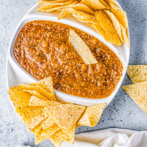Pineapple Chipotle Salsa - A sweet and spicy salsa with a lovely smokiness from pineapple, tomatillo, onion, and garlic that are blistered under broiler and then blended with chipotle peppers! PERFECT over tacos, with chips, or as a great addition to any Mexican-inspired meal! 
