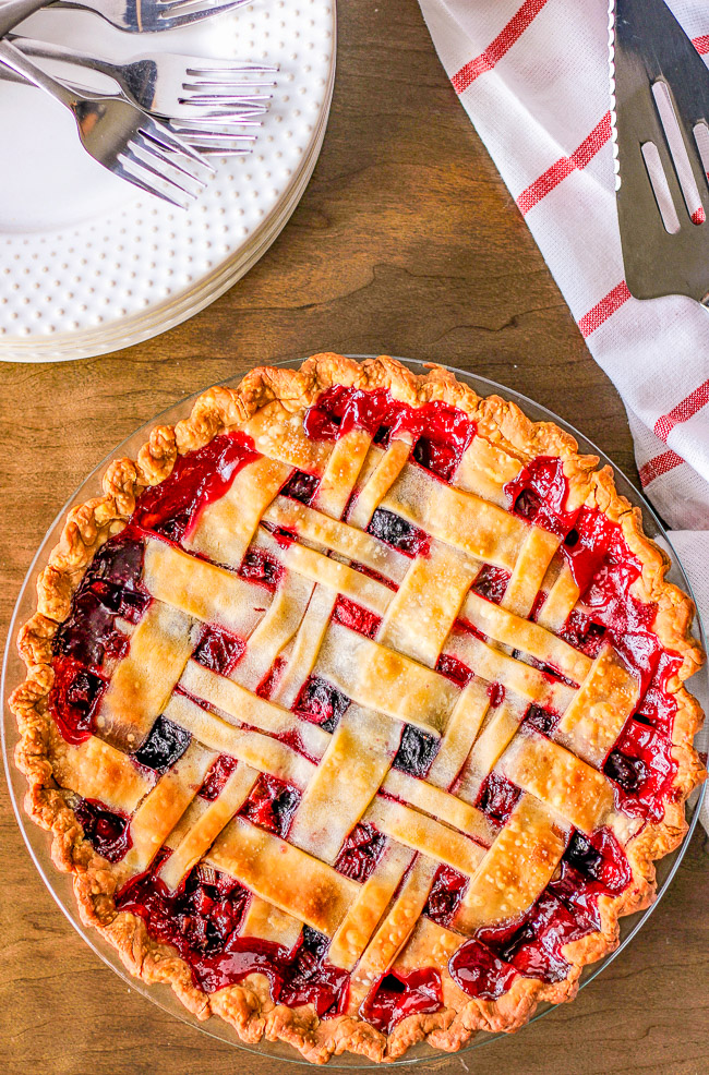 Rhubarb Berry Pie - A classic, EASY, fruit pie made with rhubarb, strawberries, and blueberries! Sweet yet a bit tart, very juicy, and a PERFECT spring or summer dessert! Use a store bought pie crust to save time!