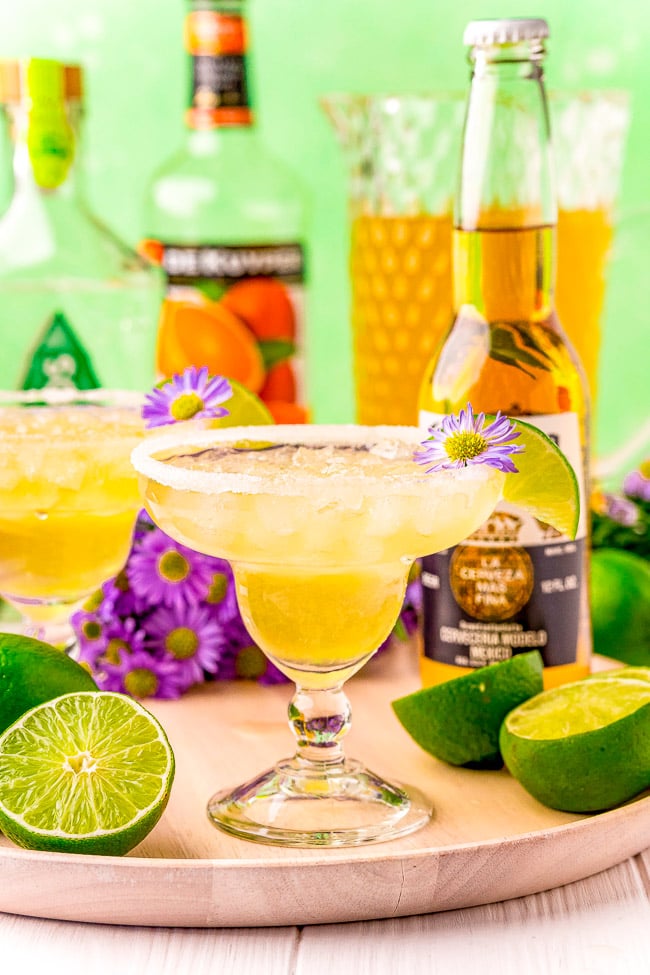 Beer Margaritas - Summer tastes better with a pitcher of these delightful and refreshing beer margaritas are made with Corona, tequila, triple sec, lime juice, agave, and a sugared (or salted) rim! Cheers to beer-garitas!