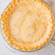 Easy Flaky All Butter Pie Crust - This perfect pie crust is so FLAKY and BUTTERY! It's EASY, no-fuss, and foolproof! It's great pre-baked to use in no-bake pies or for double-crust pies!